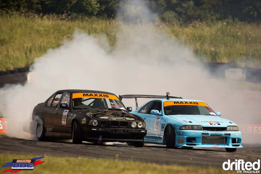 EVENT: The Scorcher: 2013 Maxxis British Drift Championship Round Three - Image Ste Trackslide BDC RD3 5 Series Vs Blue R33 2