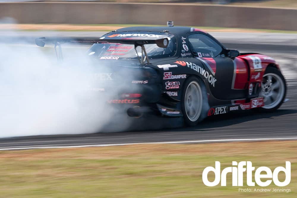 Ultimate Mazda RX-7 Guide - Everything You Need To Know - Image black mazda rx7 fd3s drifting rear