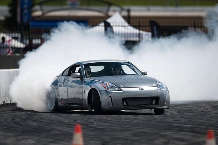 11 Best Cheap Drift Cars In 2025 - Image nissan 350z drifting smoke screen