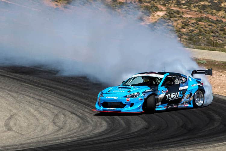 Miata Vs BRZ - Which Is Best? - Image dai yoshihara fd formula drift big angle smoke blue