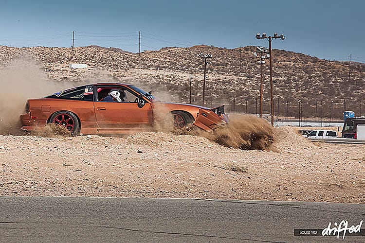 Snap Oversteer - What Exactly Is It? - Image range brown nissan 240sx 180sx silvia gravel trap