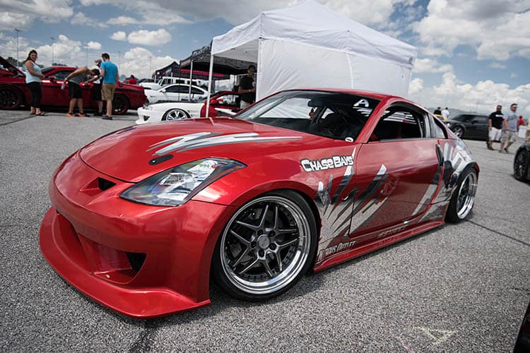 Nissan 350Z Lug Pattern: Sizes, Specs, Offset, And PCD - Image stance low red show nissan