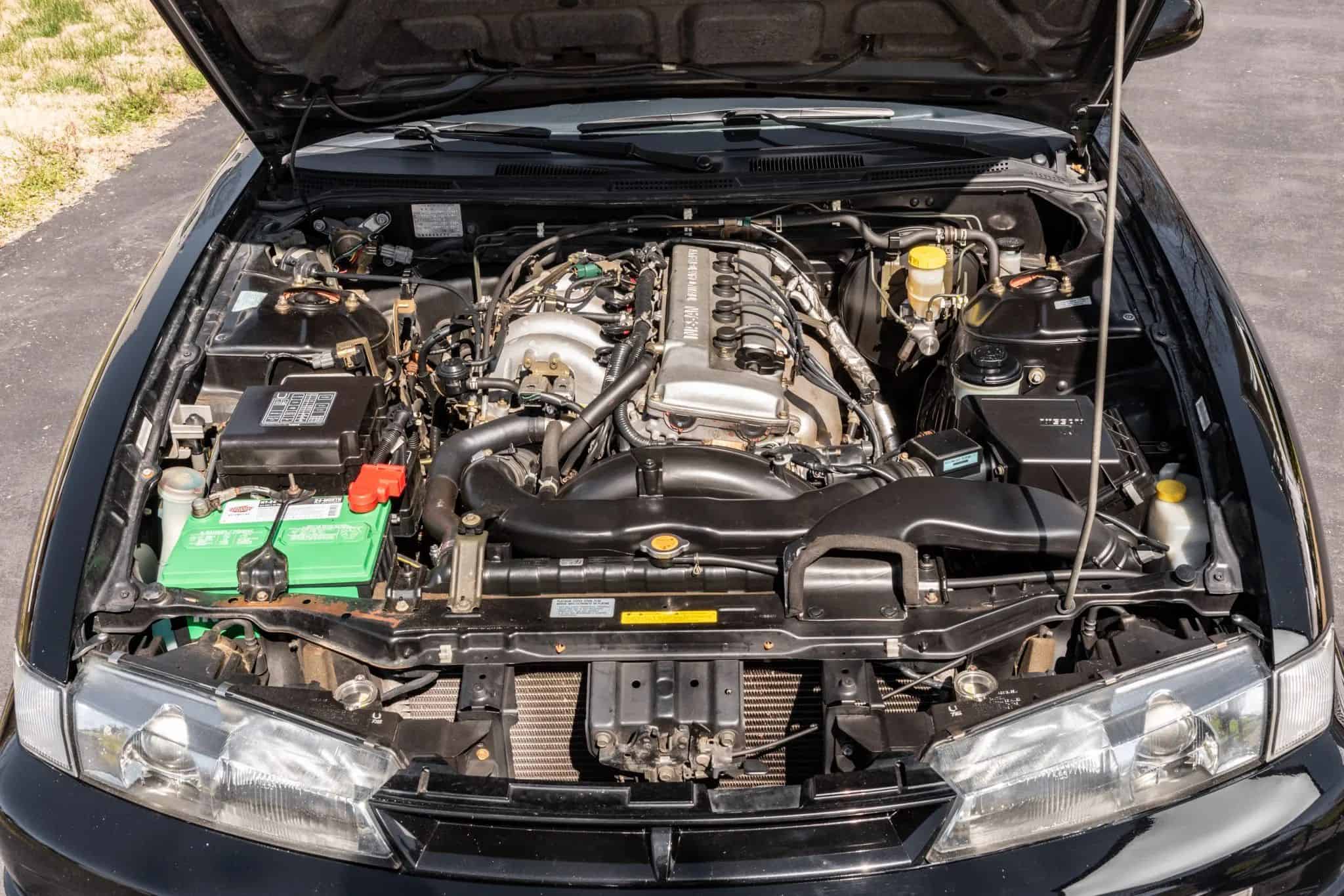 Stock 240SX Sells For $31k After 26 Years And 119K Miles - Image clean under hood stock 1997 nissan 240sx sells for 31k