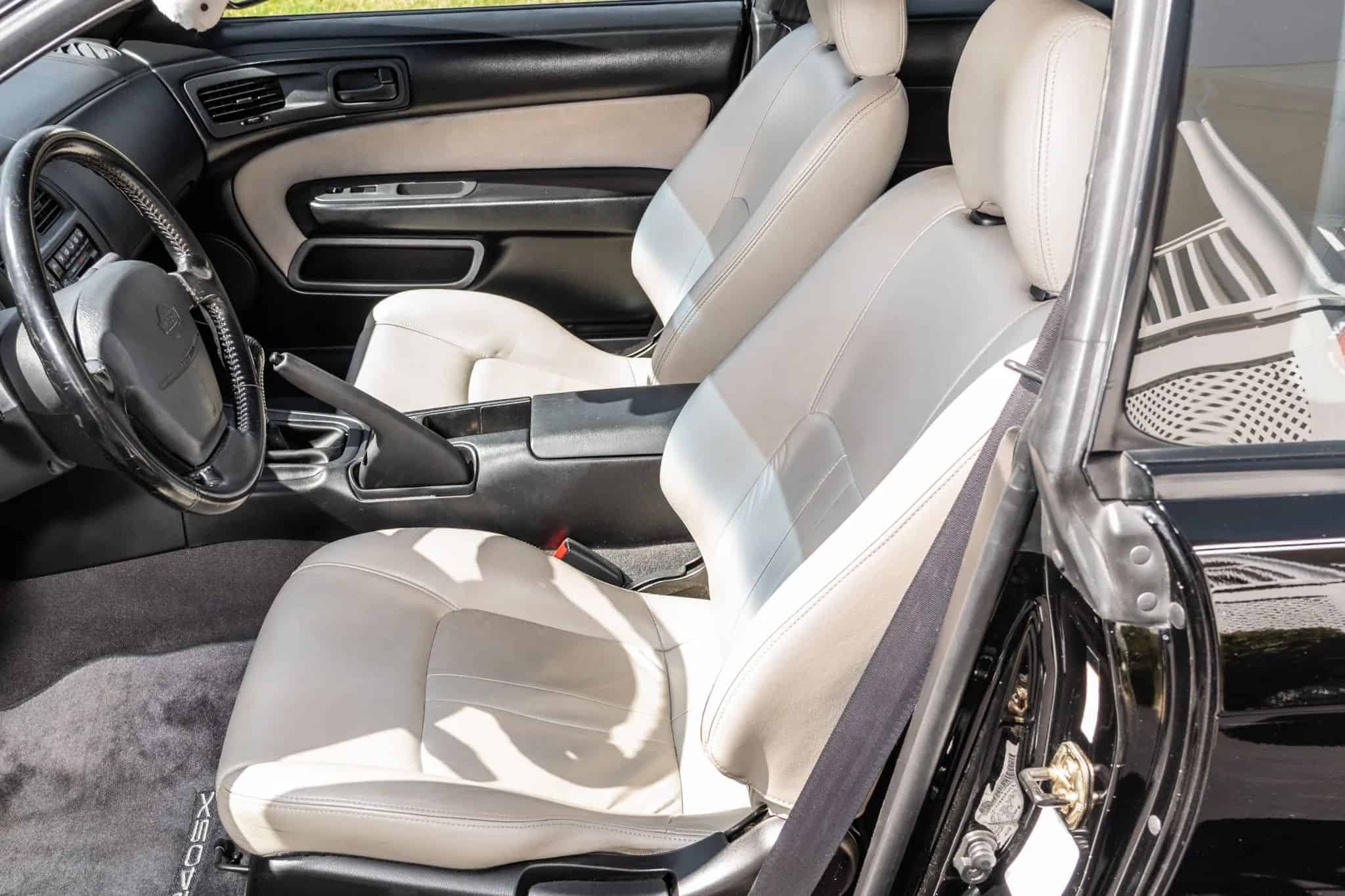 Stock 240SX Sells For $31k After 26 Years And 119K Miles - Image front seats cream titanium interior 1997 nissan 240sx sells for 31k