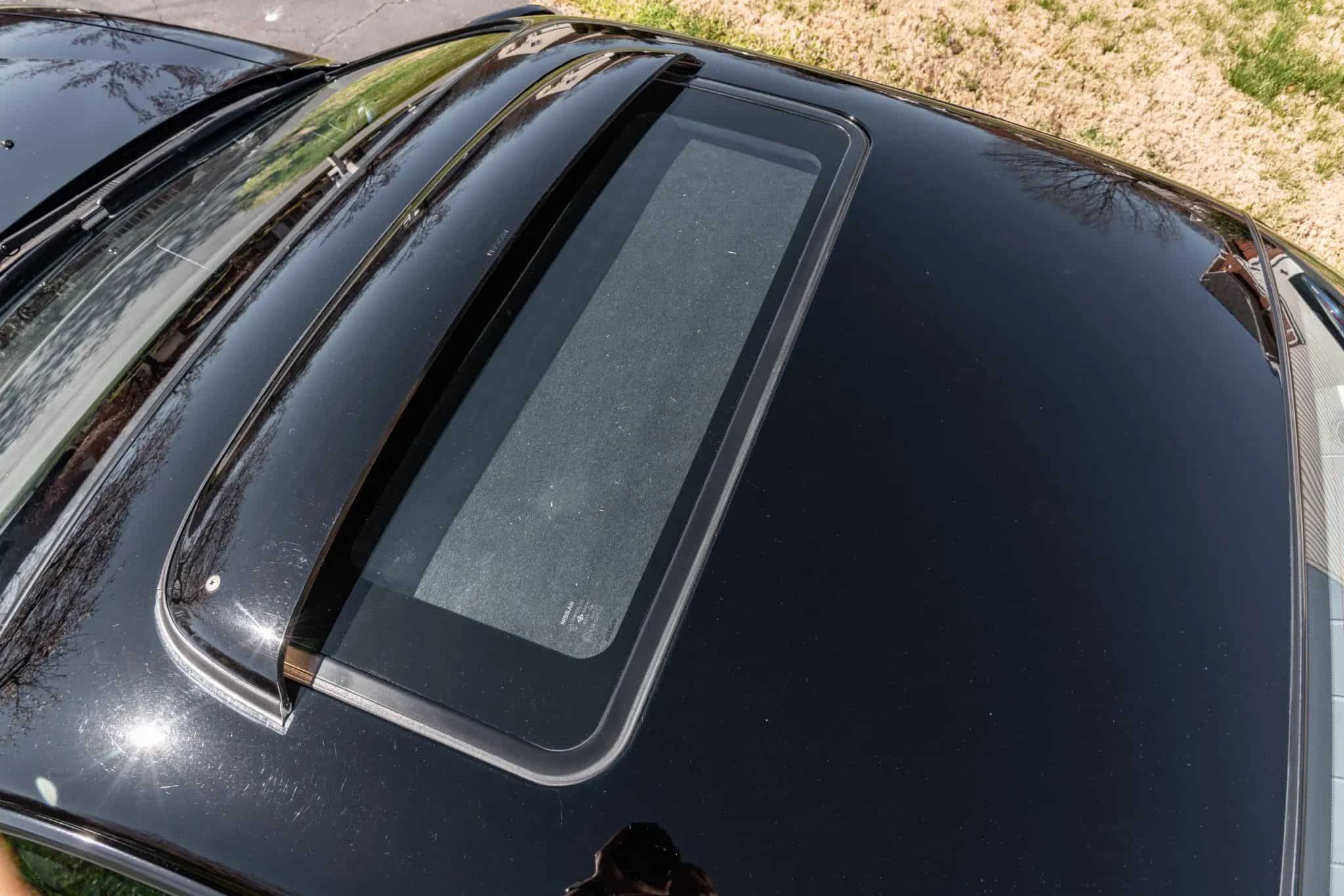 Stock 240SX Sells For $31k After 26 Years And 119K Miles - Image sunroof visor rare 1997 nissan 240sx sells for 31k